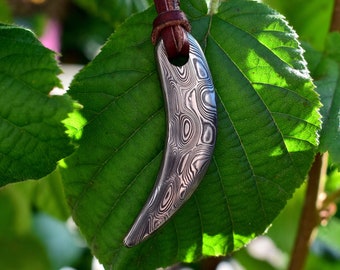Viking Age Style Damascus Steel Bear's/Wolf's Tooth Pendant, comes supplied with jewelry cord.