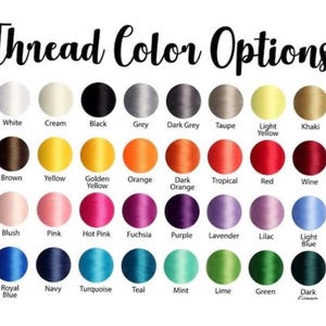 May include: Image displaying a color chart labeled "Thread Color Options." The chart features a variety of thread colors, including white, black, grey, yellow, orange, red, pink, purple, blue, and green, each with its name below.