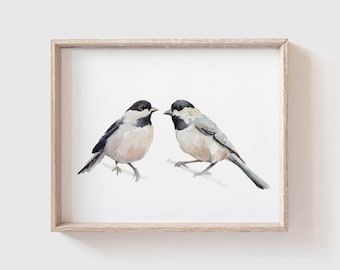May include: Watercolor painting of two black-capped chickadees perched on branches, facing each other. The birds are painted in shades of gray, white, and black, with delicate details on their feathers.