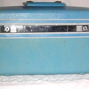 Maleta de viaje Samsonite vintage: Silueta turquesa, equipaje de los años 60