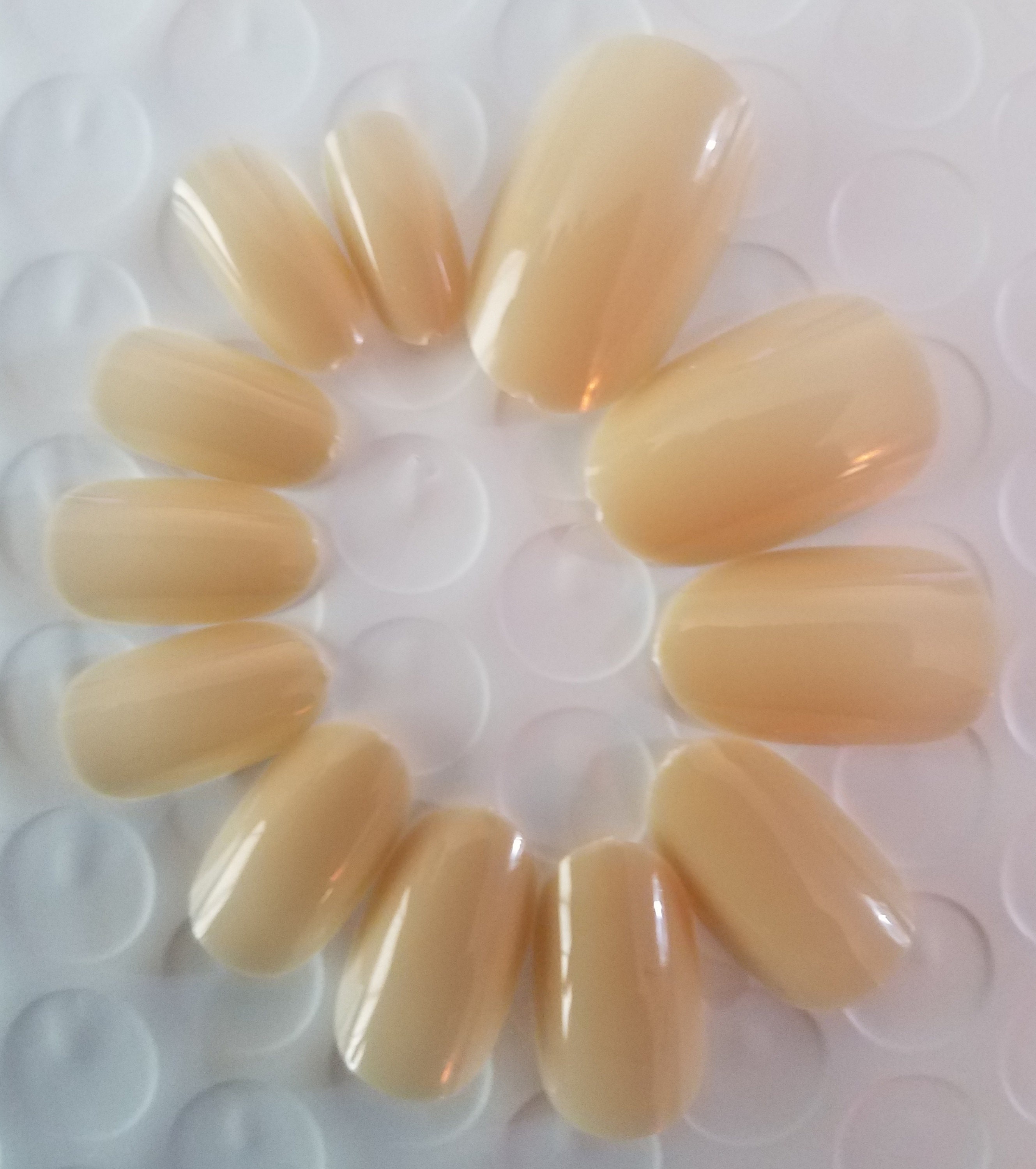 cream oval nails
