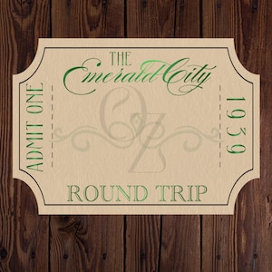May include: A vintage-style ticket with a green and brown color scheme. The ticket reads "The Emerald City" and "Round Trip" with the year "1939" printed on the right side.