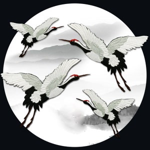 May include: Four white and black embroidered crane patches with red beaks. The cranes are flying in a white and gray cloudy background.