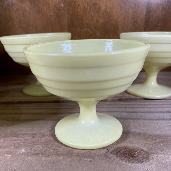 Yellow milk glass dessert bowls and creamer Hazel Atlas Platonite footed sherbet ice cream or berry