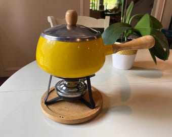 Yellow vintage fondue pot