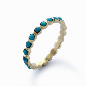 Turquoise stones gold eternity ring