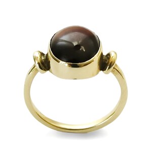 Oval Gold ring with Garnet