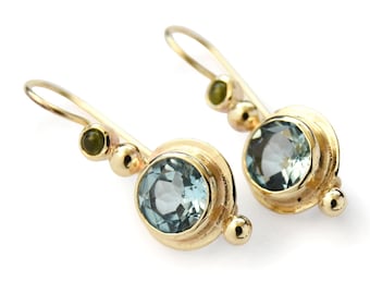 Pendientes colgantes de oro con topacio azul