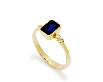 Gold Ring with Square Blue Sapphire and Zircon Accents