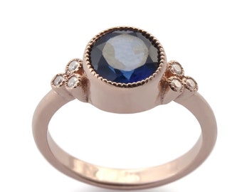 Rose Gold Estate ring with Sapphire and Zircons