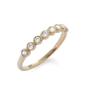 Half eternity gold Ring with Clear Zircons