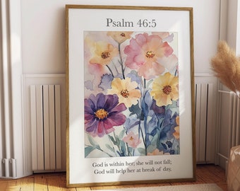 May include: A watercolor painting of a bouquet of flowers in shades of pink, yellow, purple, and blue. The flowers are arranged in a vase and the background is a light blue. The painting is framed in a wooden frame and the text "Psalm 46:5" is printed at the top. The text below the flowers reads "God is within her; she will not fall; God will help her at break of day."