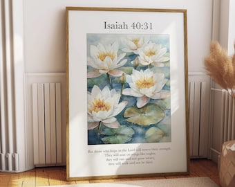 May include: A watercolor painting of white water lilies with yellow centers, set against a background of green lily pads and blue water. The painting is framed in a wooden frame and includes the text "Isaiah 40:31" and a quote from the Bible verse: "But those who hope in the Lord will renew their strength. They will soar on wings like eagles; they will run and not grow weary, they will walk and not be faint."