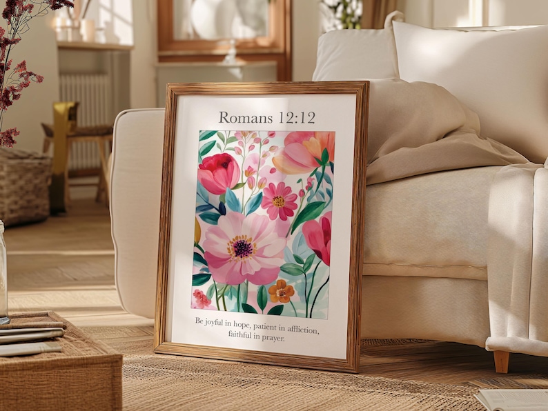 May include: A framed print with a floral design and the text "Romans 12:12 Be joyful in hope, patient in affliction, faithful in prayer."