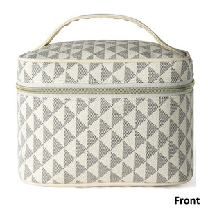 May include: A white and gray geometric patterned cosmetic bag with a gold zipper and a top handle. The bag is labeled "Front".