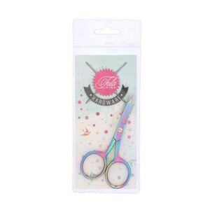 May include: A pair of rainbow-colored craft scissors in a clear plastic package. The scissors have a colorful, iridescent finish. The package has the text "Tula Pink HARDWARE" in a pink and black design, with needles and stars.