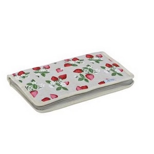 May include: A rectangular, light-colored fabric wallet with a repeating pattern of red strawberries, green leaves, and white flowers. The wallet is closed and has a gray border.