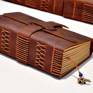 Handmade Leather Bible Cases with Cross | The Skipping Stone