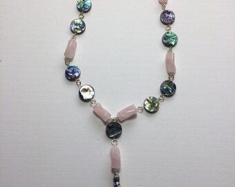 Rose quartz twisted tube necklace with abalone coins and tassel