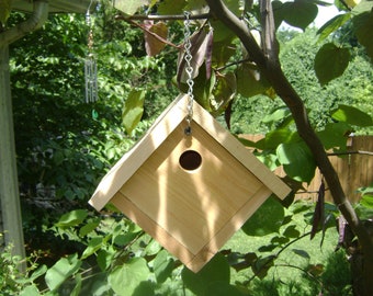 Wren House is hand crafted from brown cedar for long lasting durability