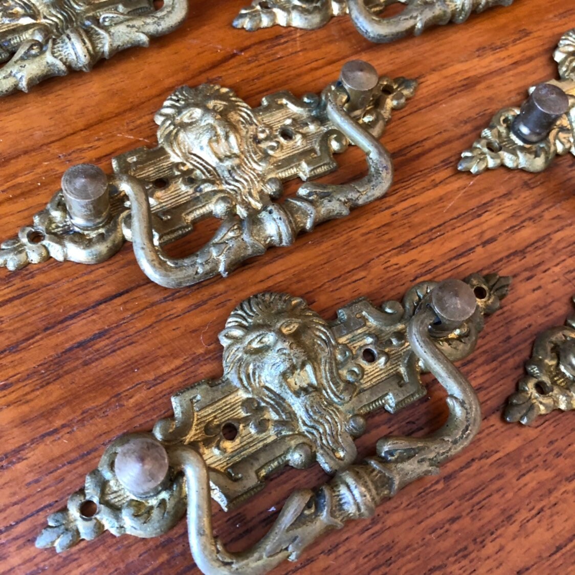 Set of 10 antique bronze lion head drawer pulls / Victorian Edwardian