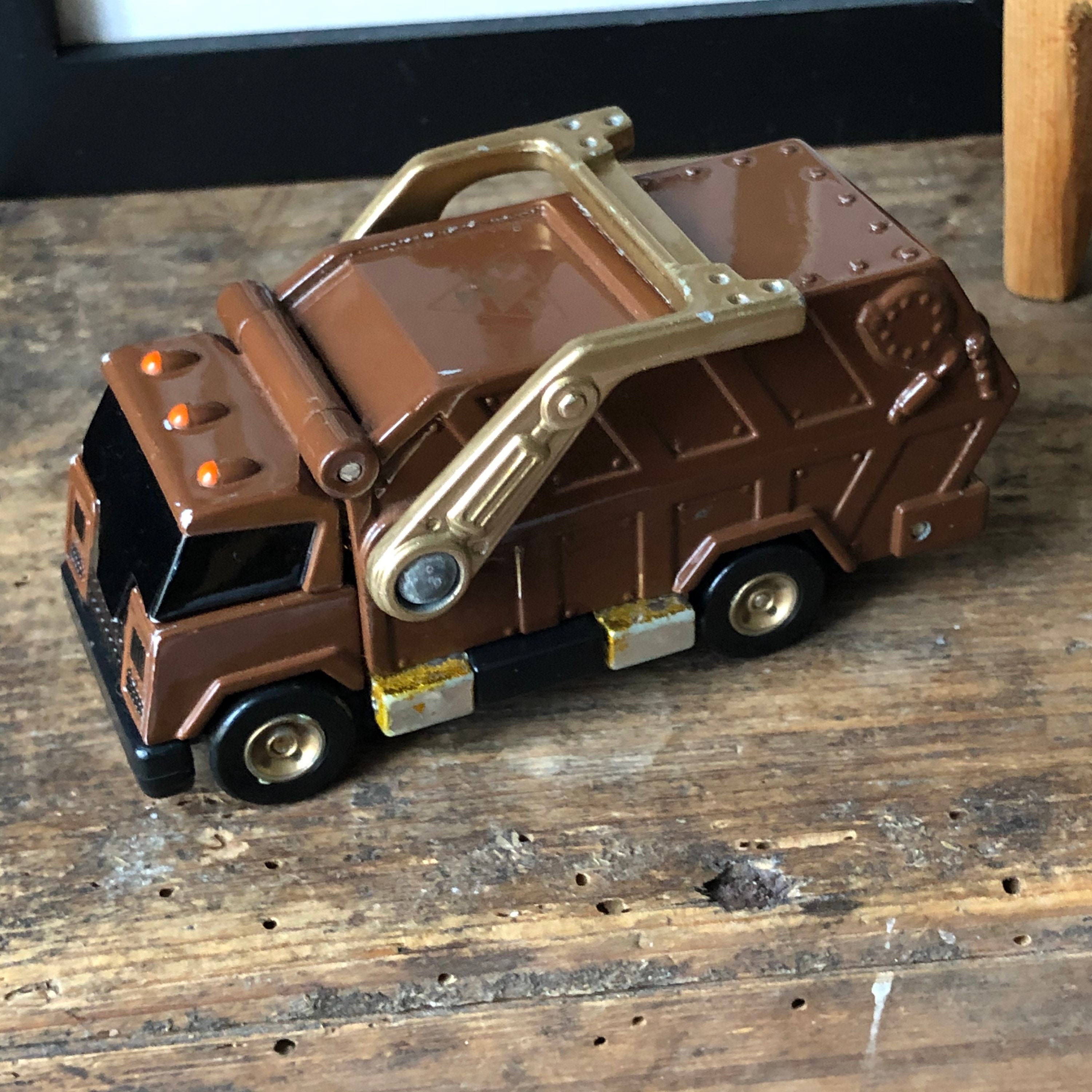 Vintage toy cast transformer garbage truck made by Maisto toys