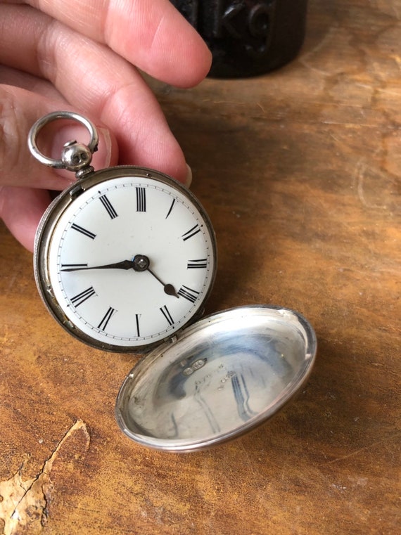 Antique sterling silver pocket watch stamped maker Barrett Portsmouth 31888 made in England signed 1853