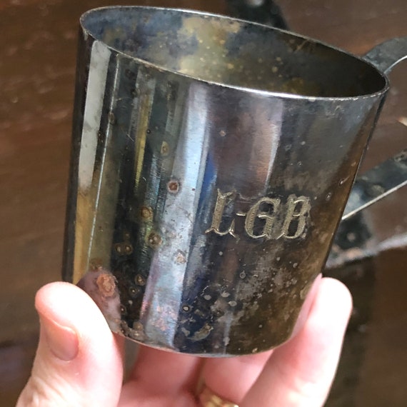 Silver plated small cup with handle engraved LGB with patina