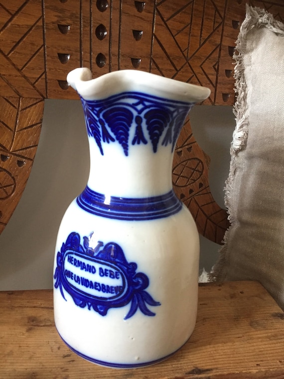 Antique/Spanish/Jug/Vivera/ceramic pot/ Hermano bebe Que la vida es breve/white and blue/Spain/vase