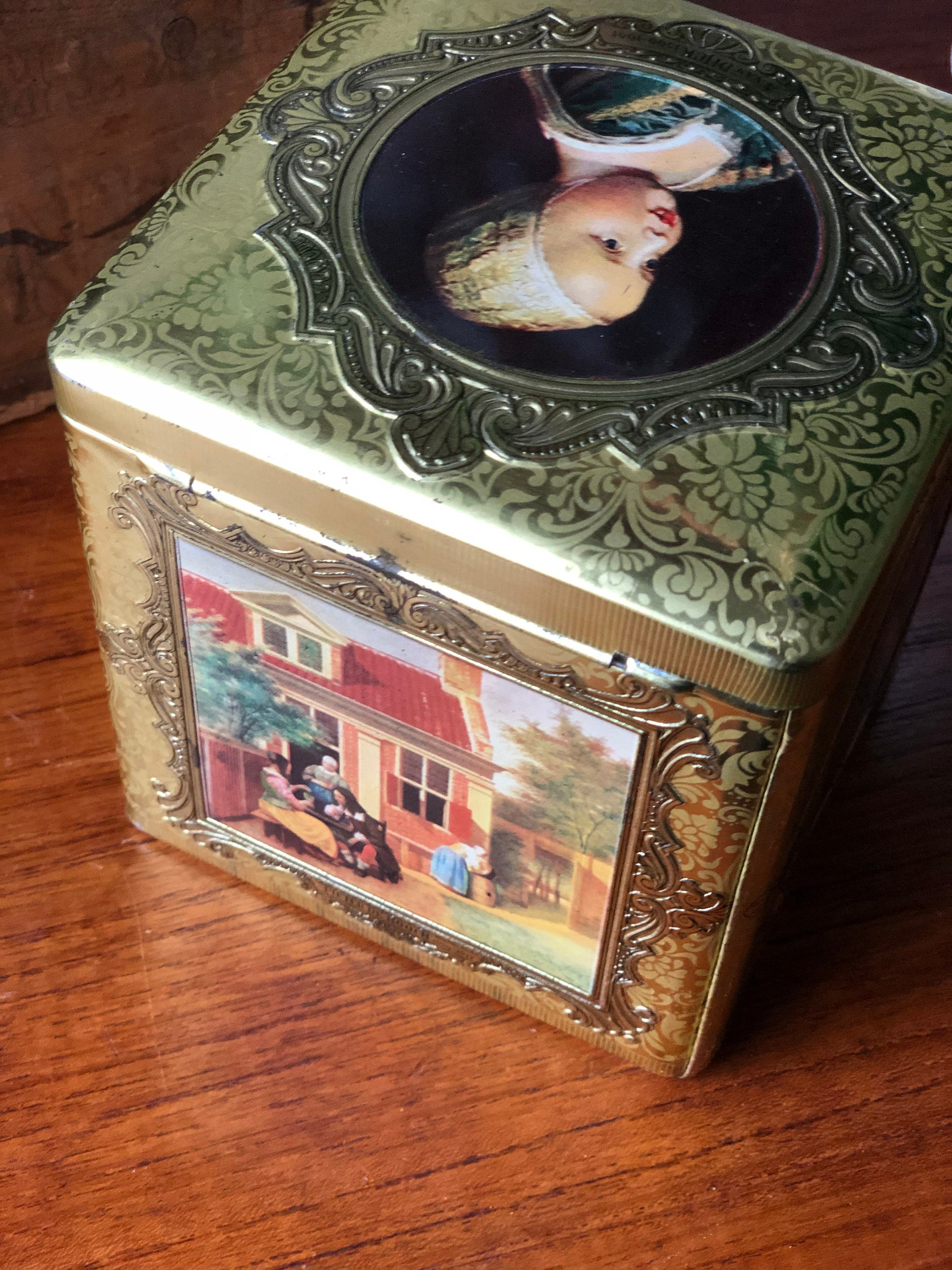 Vintage gold Dutch collectible tin of famous painters /paintings made