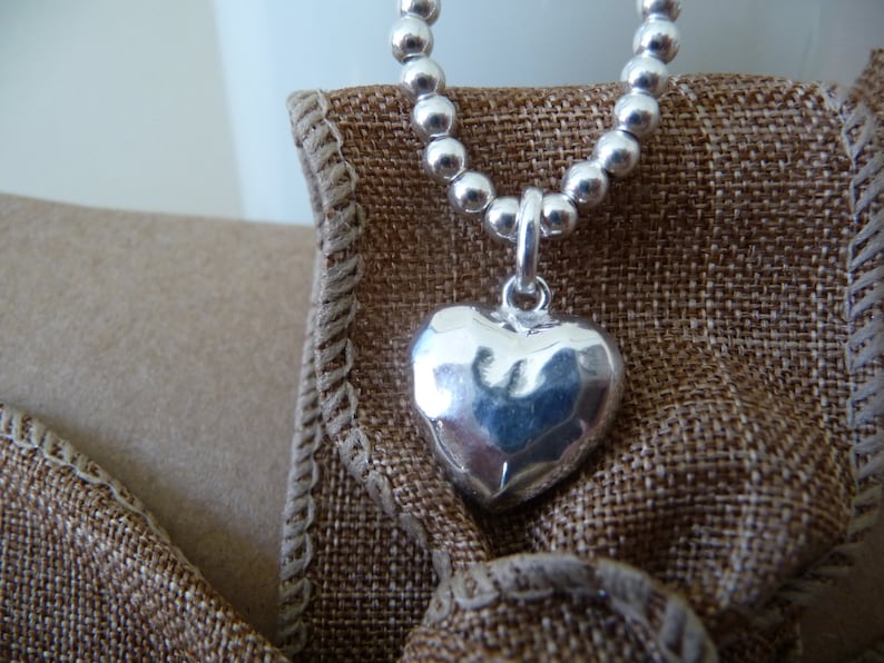GORGEOUS 925 Puffed Hammered Heart Charm on a Sterling Silver Bead Bracelet.