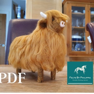 May include: A brown and white needle felted Highland Cow figurine. The cow is standing on a wooden table. The text "PDF" is in the foreground of the image. The text "Felts by Philippa Needle Felting Artist" is in the background of the image.
