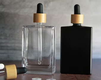 Rechthoekige fles helder glas: cosmetische verpakking van 3,4 oz