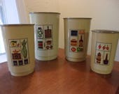 vintage canister set,hard plastic canister set,beige with green lids,kitchen art,fruit,veggies,coffee grinder pot,cutting board,pickles