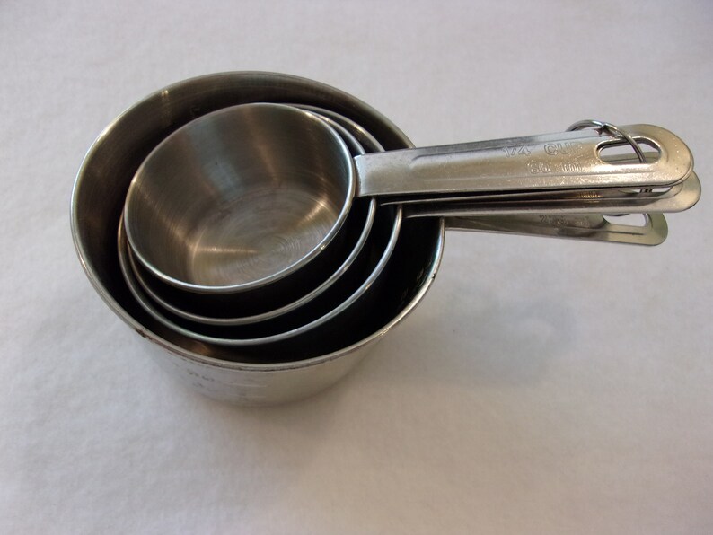 vintage measuring cups,heavy stainless steel,vintage kitchen accessories,retro kitchen,cooking utensils,1 cup,12 cup,13 cup,14 cup,gift