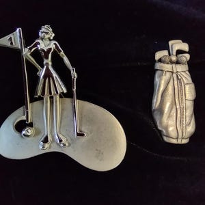 golf theme brooches,(2) brooches,golf bag with clubs,pewter,pierced earrings,AJC lady golfer brooch,silver tone metal,golfer gift,vintage