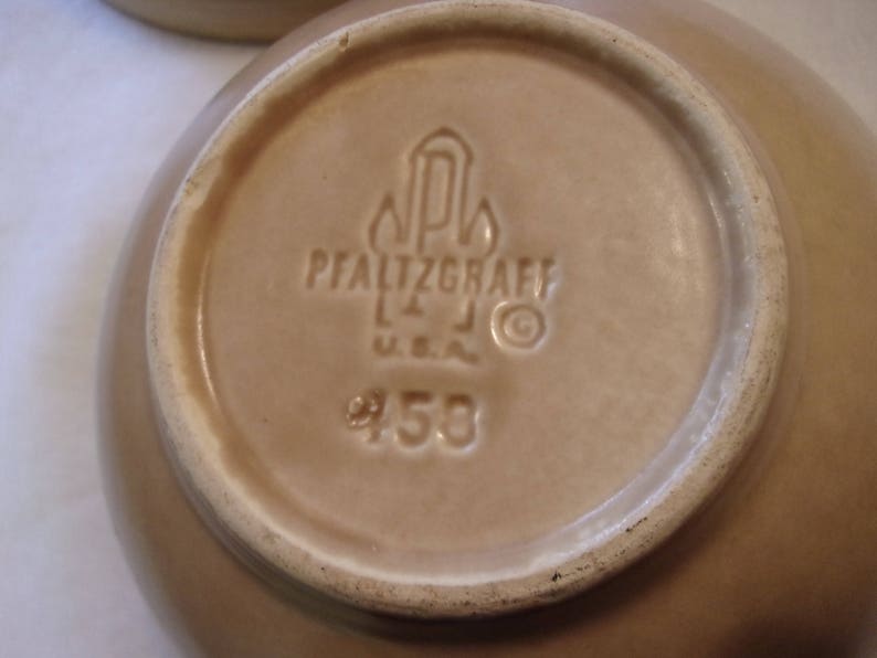 mixing bowls,earth-tone and blue,10 and 8 across,stoneware,made in USA,serving,farm house Pfaltzgraff,Folk Art pattern,1980/'s pattern, 2