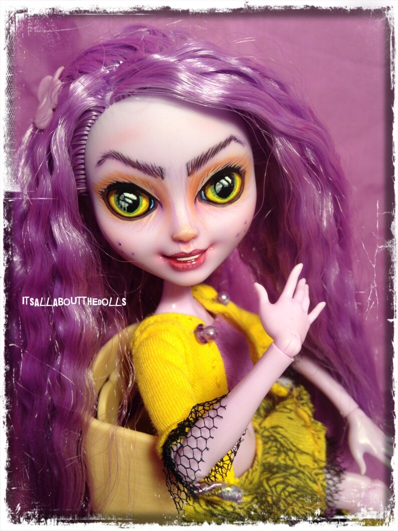 kitty cheshire muñeca