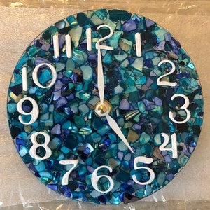 The Perfect Gift Found! Beautiful, vibrant clocks created from sea glass, shells and resin. Home & Beach Decor. Wall Clock. 12” available.