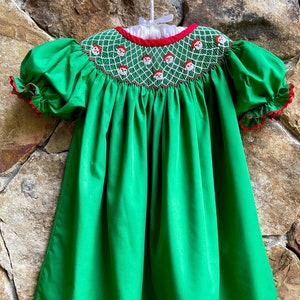 Smocked girls Christmas Santa bishop dress emerald green fabric with red white smocking classic tree