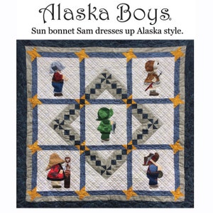 May include: A quilt with a blue, white, and yellow patchwork design. The quilt features five appliqued figures of children dressed in different outfits. The text "Alaska Boys" is at the top of the quilt and the text "Sun bonnet Sam dresses up Alaska style." is below the quilt.