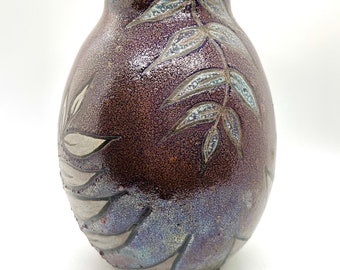 Wheel thrown decorative Raku Vase with leaf decoration