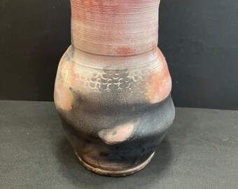 Wheel thrown decorative pit fired vase