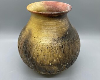 Wheel thrown decorative pit fired vase