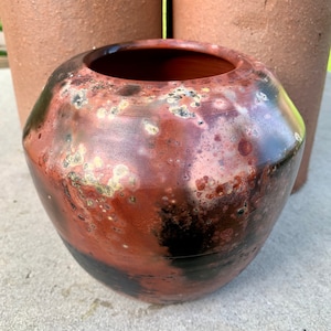 Pit fired decorative vase or bowl