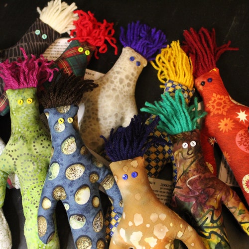 12 O. Damn-it Dolls with shops one free (baker’s dozen) and reduced shipping!