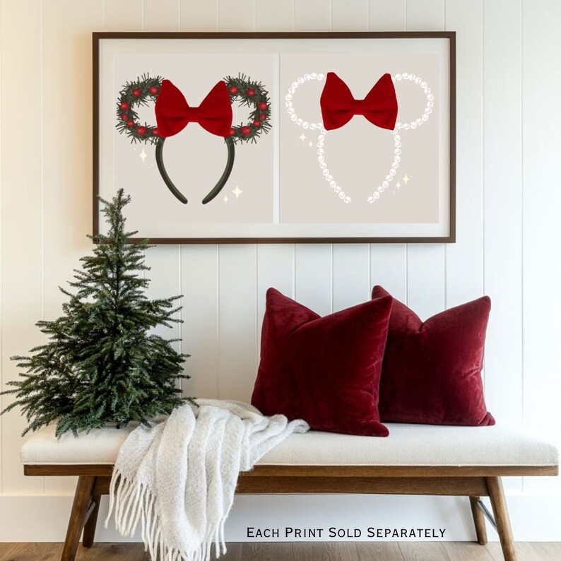 May include: Two framed prints featuring holiday-themed headbands with red bows. One headband is adorned with a wreath and berries, the other with pearls. The prints are displayed above two red velvet pillows on a wooden bench.