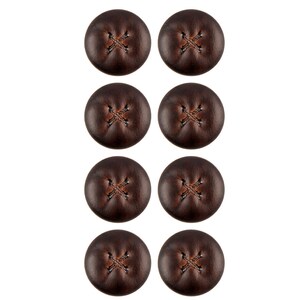 May include: Eight brown leather buttons with a cross stitch design.