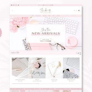 May include: A website layout for Sydney Boutique featuring a light pink and white color scheme. The header displays the brand name, navigation menu, and a banner with the text Shop the NEW ARRIVALS. Below are product images of planners.