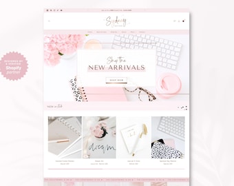 May include: A website layout for Sydney Boutique featuring a light pink and white color scheme. The header displays the brand name, navigation menu, and a banner with the text Shop the NEW ARRIVALS. Below are product images of planners.